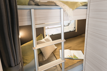 2-person bunk bed, optionally also available with a 3-person bunk bed (depending on layout)