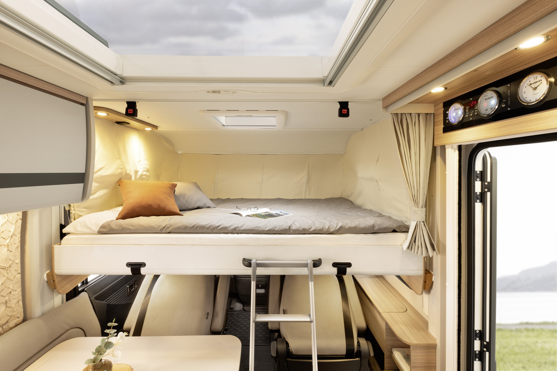 The pull-down bed in the A Class models has a sleeping area with a width of 150 cm