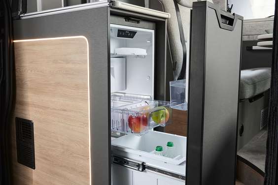 The pull-out fridge at the front is easy to reach from all sides.