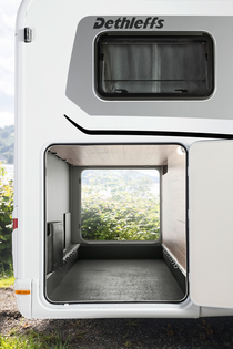 Large rear garages with access from both sides and new, smooth-running twist/quick-release latches
