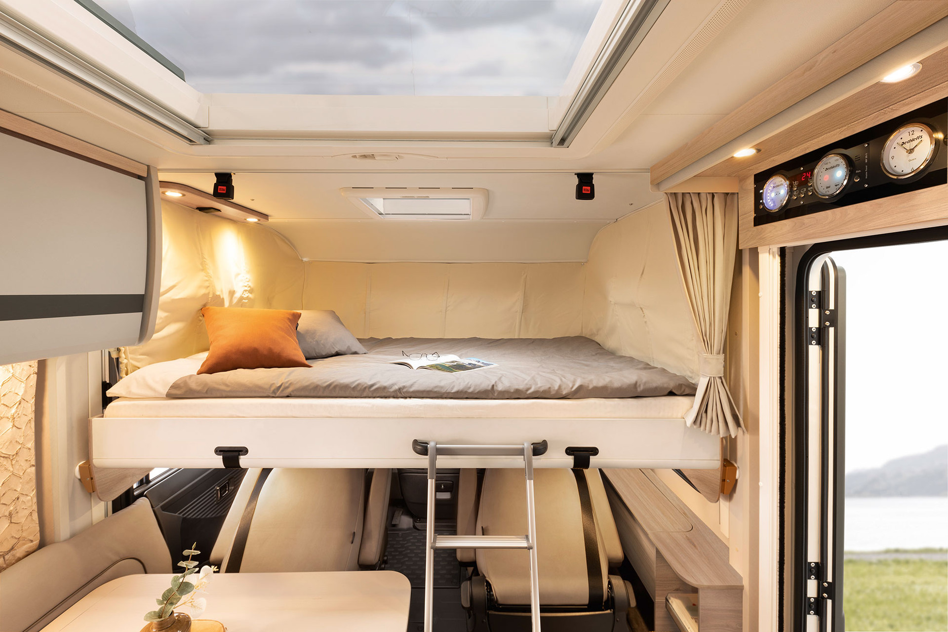 The pull-down bed in the A Class models has a sleeping area with a width of 150 cm