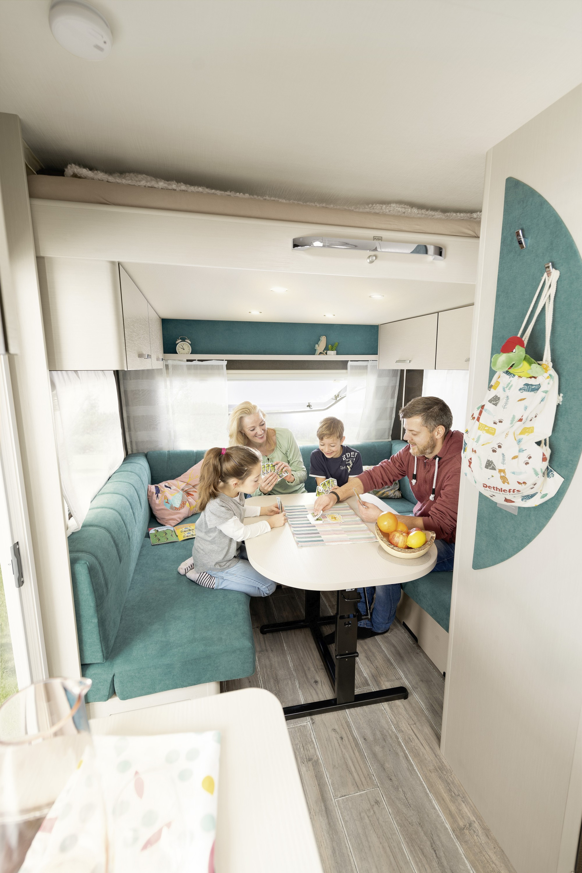 As soon as the pull-down bed is stowed under the roof, your c’go up is ready for the day’s activities. And in bad weather, the kids can play happily in their own children’s area • 525 KR | Blue Lagoon